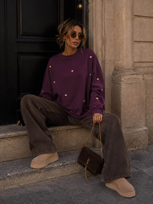 Sweater Aubergine mit Herzdetails