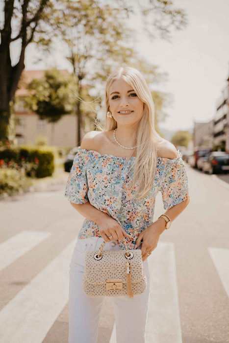 schulterfreie Bluse mit Blumenprint Off White